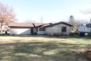 Welcome home to this 3 Bedroom Brick Ranch nestled on the on Spencer Golf and Country Club in Iowa - for sale on GolfHomes.com, golf home, golf lot