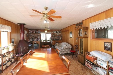 Welcome home to this 3 Bedroom Brick Ranch nestled on the on Spencer Golf and Country Club in Iowa - for sale on GolfHomes.com, golf home, golf lot