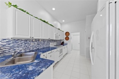 Welcome to 28448 Highgate Dr--a beautifully maintained 2-bedroom on Spanish Wells Golf and Country Club in Florida - for sale on GolfHomes.com, golf home, golf lot