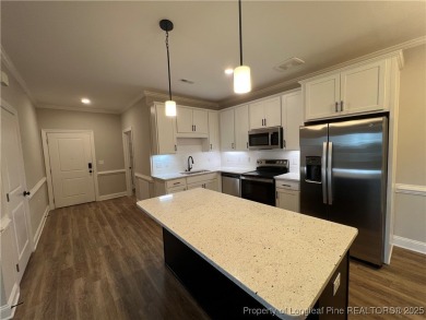 Experience the epitome Condo Living in The Gated Community at on Anderson Creek Golf Club in North Carolina - for sale on GolfHomes.com, golf home, golf lot