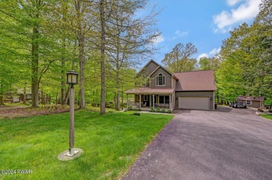 This Tanglwood Lakes home is located only a hop, skip, and jump on Paupack Hills Golf and Country Club in Pennsylvania - for sale on GolfHomes.com, golf home, golf lot