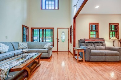 This Tanglwood Lakes home is located only a hop, skip, and jump on Paupack Hills Golf and Country Club in Pennsylvania - for sale on GolfHomes.com, golf home, golf lot