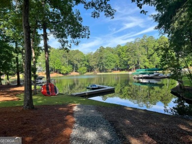 1041 Liberty Chapel Lane - Lake Access Living in Reynolds Lake on Reynolds Lake Oconee - The Oconee in Georgia - for sale on GolfHomes.com, golf home, golf lot