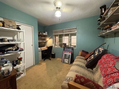 Experience the perfect blend of comfort and elegance in this on Spring River Golf Course in New Mexico - for sale on GolfHomes.com, golf home, golf lot