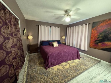 Experience the perfect blend of comfort and elegance in this on Spring River Golf Course in New Mexico - for sale on GolfHomes.com, golf home, golf lot