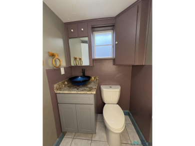 Experience the perfect blend of comfort and elegance in this on Spring River Golf Course in New Mexico - for sale on GolfHomes.com, golf home, golf lot