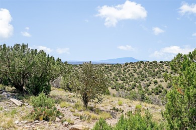 Single level home with views of the Sandias and surrounding on Pueblo de Cochiti Golf Course in New Mexico - for sale on GolfHomes.com, golf home, golf lot