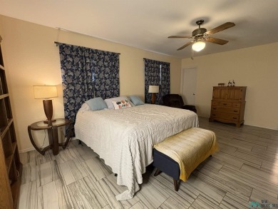 Experience the perfect blend of comfort and elegance in this on Spring River Golf Course in New Mexico - for sale on GolfHomes.com, golf home, golf lot