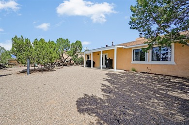 Single level home with views of the Sandias and surrounding on Pueblo de Cochiti Golf Course in New Mexico - for sale on GolfHomes.com, golf home, golf lot