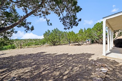 Single level home with views of the Sandias and surrounding on Pueblo de Cochiti Golf Course in New Mexico - for sale on GolfHomes.com, golf home, golf lot