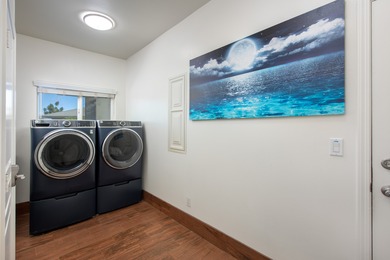 With sweeping 180-degree ocean views and a backdrop of 5 on Waikoloa Village Golf Club in Hawaii - for sale on GolfHomes.com, golf home, golf lot