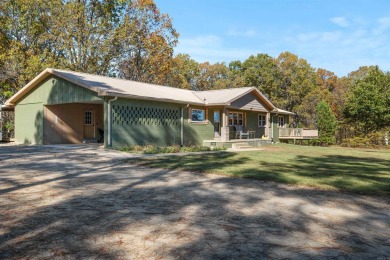 Welcome to this beautifully updated all-brick 4-bedroom on Rolling Hills Country Club in Arkansas - for sale on GolfHomes.com, golf home, golf lot