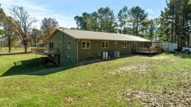 Welcome to this beautifully updated all-brick 4-bedroom on Rolling Hills Country Club in Arkansas - for sale on GolfHomes.com, golf home, golf lot