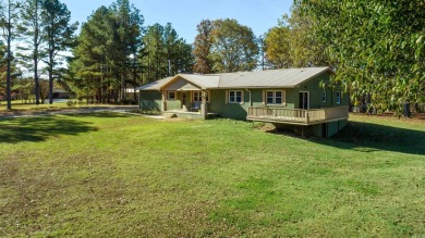 Welcome to this beautifully updated all-brick 4-bedroom on Rolling Hills Country Club in Arkansas - for sale on GolfHomes.com, golf home, golf lot