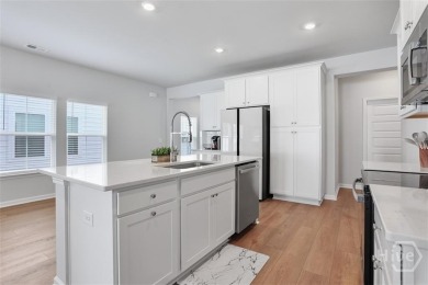 Enjoy low maintenance living in this immaculate single story on Savannah Quarters Country Club in Georgia - for sale on GolfHomes.com, golf home, golf lot