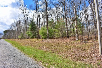 Check out this nice level and wooded lot right across the street on Lake Tansi Village Country Club in Tennessee - for sale on GolfHomes.com, golf home, golf lot