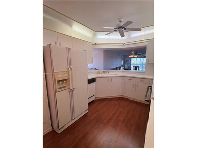 55+ Community, Move-in ready 2 bedroom + den, spacious enclosed on Sunrise Lakes Phase III in Florida - for sale on GolfHomes.com, golf home, golf lot