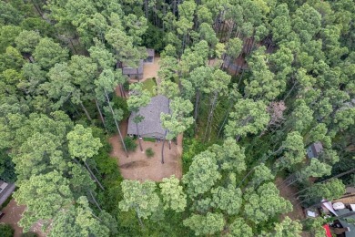 Amazing one-of-a kind home in highly sought-after gated on Holly Lake Ranch Golf Club in Texas - for sale on GolfHomes.com, golf home, golf lot