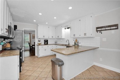 Welcome to this beautifully maintained gem in the highly sought on Gates Four Golf and Country Club in North Carolina - for sale on GolfHomes.com, golf home, golf lot
