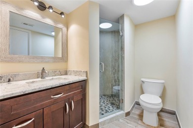 Beautifully renovated 3-bedroom, 2-bathroom corner unit in Holly on Woodmont Country Club in Florida - for sale on GolfHomes.com, golf home, golf lot