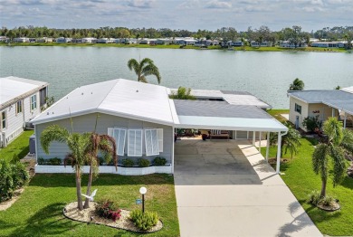 This stunning lakefront retreat in the sought-after 55+ on Imperial Lakewoods Golf Club in Florida - for sale on GolfHomes.com, golf home, golf lot