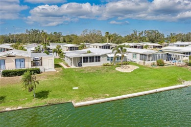 This stunning lakefront retreat in the sought-after 55+ on Imperial Lakewoods Golf Club in Florida - for sale on GolfHomes.com, golf home, golf lot