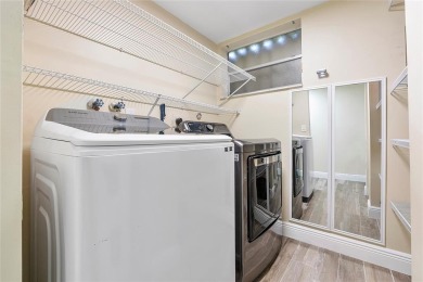Beautifully renovated 3-bedroom, 2-bathroom corner unit in Holly on Woodmont Country Club in Florida - for sale on GolfHomes.com, golf home, golf lot
