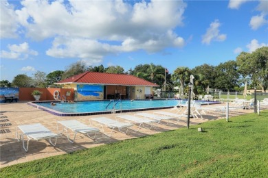 Turnkey 2/2 home in Barefoot Bay with stunning lake views! Enjoy on Barefoot Bay Golf Course in Florida - for sale on GolfHomes.com, golf home, golf lot