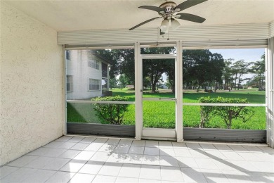 Beautifully renovated 3-bedroom, 2-bathroom corner unit in Holly on Woodmont Country Club in Florida - for sale on GolfHomes.com, golf home, golf lot
