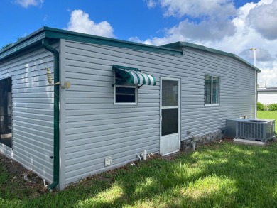 Large, well-tended, freshly painted home in desirable on East Bay Golf Club in Florida - for sale on GolfHomes.com, golf home, golf lot