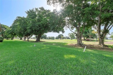 Beautifully renovated 3-bedroom, 2-bathroom corner unit in Holly on Woodmont Country Club in Florida - for sale on GolfHomes.com, golf home, golf lot