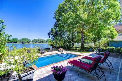 Stunning Custom Lakefront Pool Home on Ski Lake Eckles! on Babe Zaharias Golf Course in Florida - for sale on GolfHomes.com, golf home, golf lot