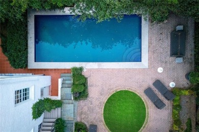 This stunning Mediterranean-style estate exudes timeless on Bobby Jones Golf Club in Georgia - for sale on GolfHomes.com, golf home, golf lot