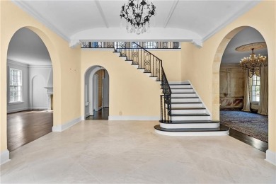 This stunning Mediterranean-style estate exudes timeless on Bobby Jones Golf Club in Georgia - for sale on GolfHomes.com, golf home, golf lot