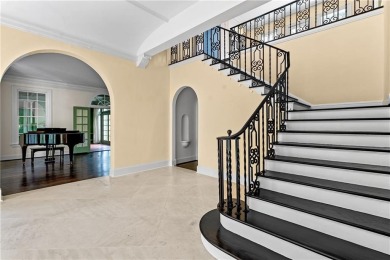 This stunning Mediterranean-style estate exudes timeless on Bobby Jones Golf Club in Georgia - for sale on GolfHomes.com, golf home, golf lot