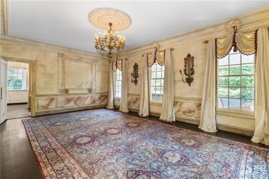 This stunning Mediterranean-style estate exudes timeless on Bobby Jones Golf Club in Georgia - for sale on GolfHomes.com, golf home, golf lot
