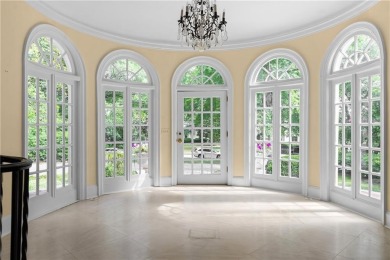 This stunning Mediterranean-style estate exudes timeless on Bobby Jones Golf Club in Georgia - for sale on GolfHomes.com, golf home, golf lot