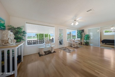 Stop By And View This Expanded Coconino Model Home On Hole on Sun City Lakes West and East in Arizona - for sale on GolfHomes.com, golf home, golf lot