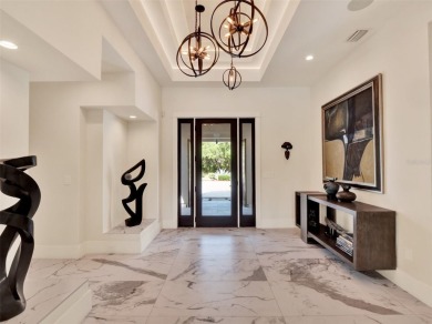 Located behind the private, 24-hour, guarded gates of the on Lake Nona Golf Club, Inc. in Florida - for sale on GolfHomes.com, golf home, golf lot
