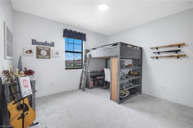 Step into resort-style living in this beautifully appointed on Old Corkscrew Golf Club in Florida - for sale on GolfHomes.com, golf home, golf lot