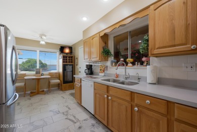 Stop By And View This Expanded Coconino Model Home On Hole on Sun City Lakes West and East in Arizona - for sale on GolfHomes.com, golf home, golf lot