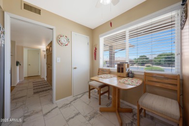 Stop By And View This Expanded Coconino Model Home On Hole on Sun City Lakes West and East in Arizona - for sale on GolfHomes.com, golf home, golf lot