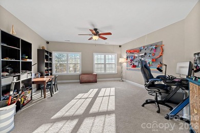 Poised on the golf course in one of Denver's most admired on Verdict Ridge Golf and Country Club in North Carolina - for sale on GolfHomes.com, golf home, golf lot