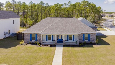 This immaculate custom-built four-bedroom, two plus half bath on The Golf Club of the Wharf in Alabama - for sale on GolfHomes.com, golf home, golf lot