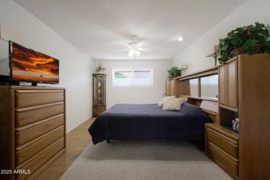 Stop By And View This Expanded Coconino Model Home On Hole on Sun City Lakes West and East in Arizona - for sale on GolfHomes.com, golf home, golf lot