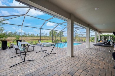Step into resort-style living in this beautifully appointed on Old Corkscrew Golf Club in Florida - for sale on GolfHomes.com, golf home, golf lot