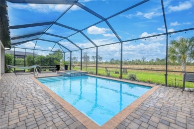 Step into resort-style living in this beautifully appointed on Old Corkscrew Golf Club in Florida - for sale on GolfHomes.com, golf home, golf lot