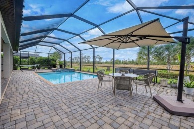 Step into resort-style living in this beautifully appointed on Old Corkscrew Golf Club in Florida - for sale on GolfHomes.com, golf home, golf lot