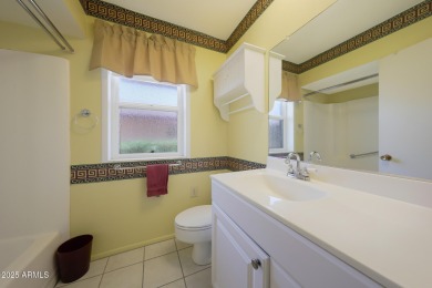 Stop By And View This Expanded Coconino Model Home On Hole on Sun City Lakes West and East in Arizona - for sale on GolfHomes.com, golf home, golf lot