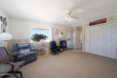 Stop By And View This Expanded Coconino Model Home On Hole on Sun City Lakes West and East in Arizona - for sale on GolfHomes.com, golf home, golf lot